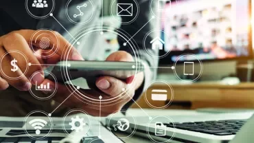 Person using smartphone with digital icons overlayed, showing connectivity and communication.