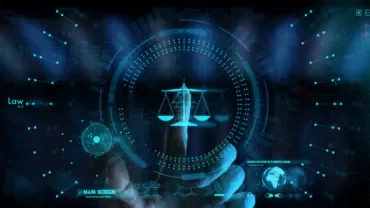 Futuristic digital interface with justice scales hologram.