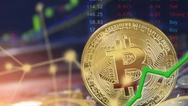 Bitcoin coin with green upward graph line indicating rising value.