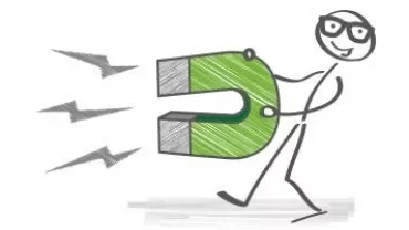 Stick figure holding a green horseshoe magnet with sparks.