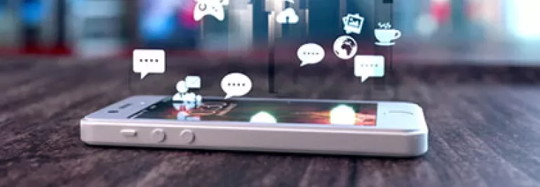 Smartphone with digital icons floating above the screen.