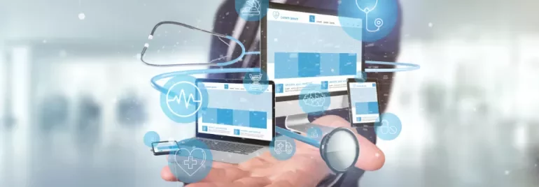Digital healthcare icons over a hand and devices.