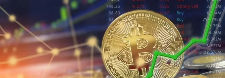 Bitcoin coin with green upward graph line indicating rising value.