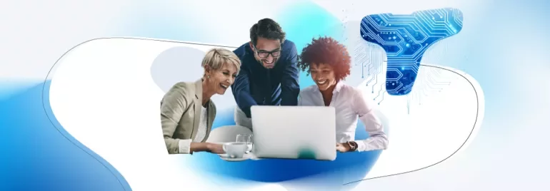 Three people looking at a laptop