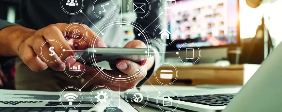 Person using smartphone with digital icons overlayed, showing connectivity and communication.
