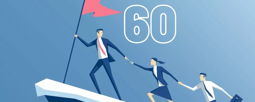 Three business figures scaling a peak, carrying a flag; number 60 in the background.
