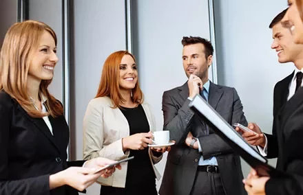 Business people having a discussion in a bright office.