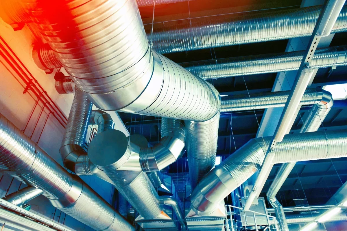 Industrial ductwork in a building ceiling.